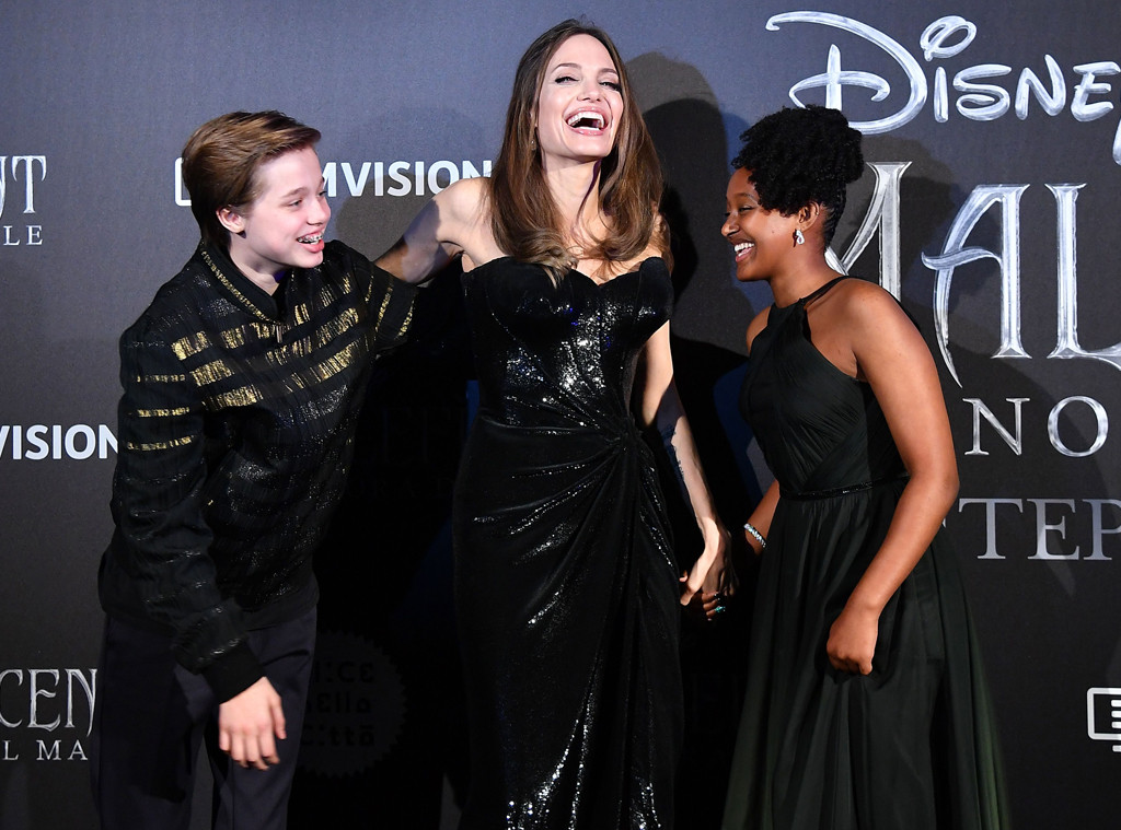 Angelina Jolie joined by kids on red carpet as they follow her around the world for Maleficent